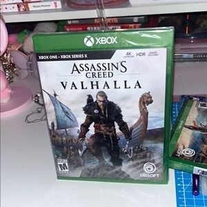 Assassin's Creed Valhalla Video Game in Green Case